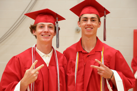 Two FHS students in cap and gown